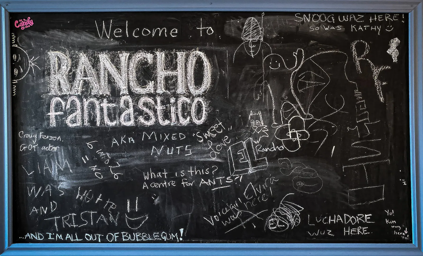 The Rancho Fantastico chalkboard wall — welcome messages and drawings from clients and friends
